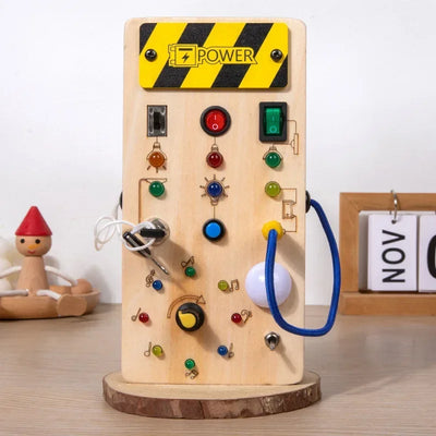 Montessori Wooden Busy Board with LED Lights – Sensory Learning Toy for Toddlers (2–4 Years) & Travel Activities.